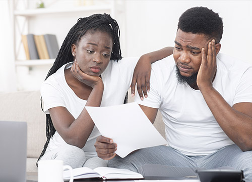 a couple stressed over bills and considering bankruptcy